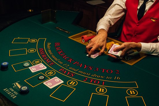 cards, dealer and blackjack table